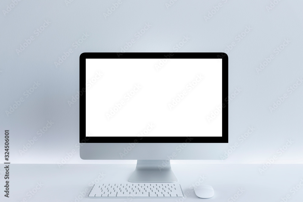 Computer with blank white copy space for text, Mockup design desktop computer in office on white table with keyboard and Coffee cub, Work place concept. Computer with blank white copy space for text, Mockup design desktop computer in office on white table with keyboard and Coffee cub, Work place concept.