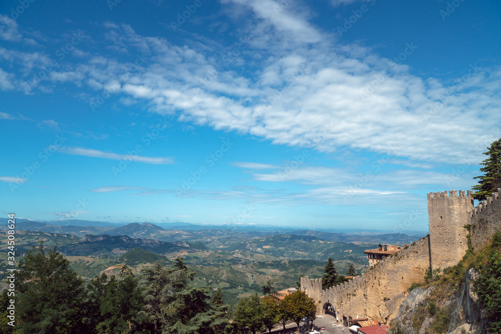 Sammer day time view panorama of mountain antic city, fortress. San Marino, Italy