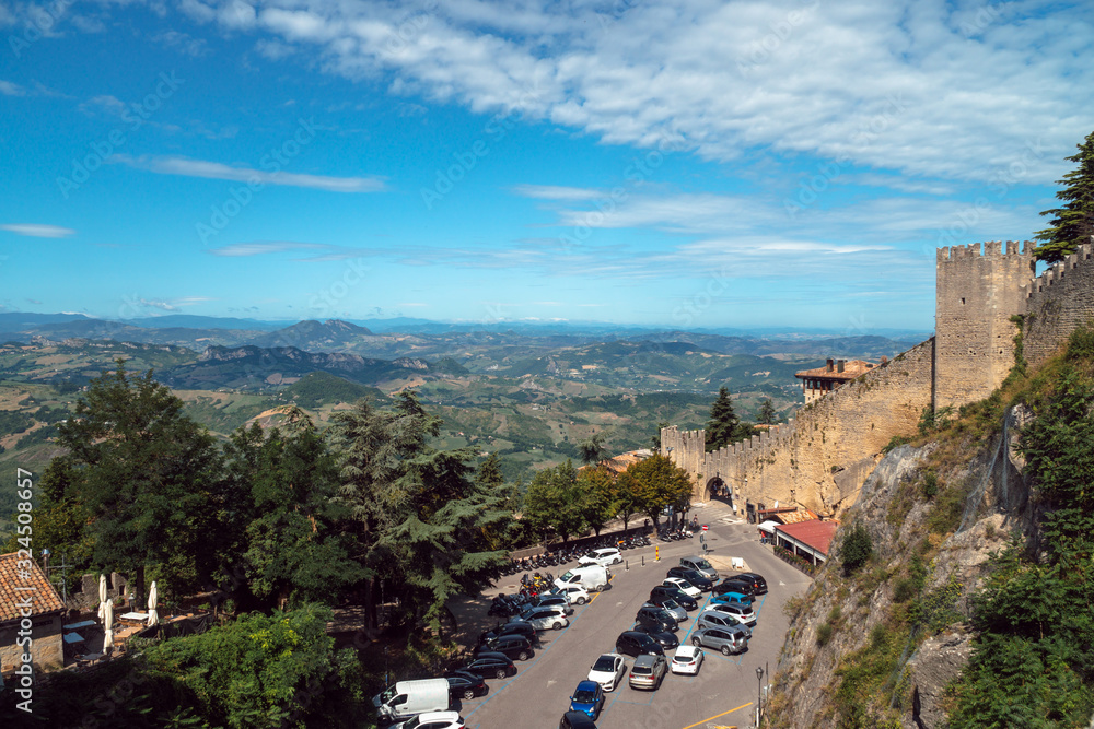Sammer day time view panorama of mountain antic city, fortress. San Marino, Italy