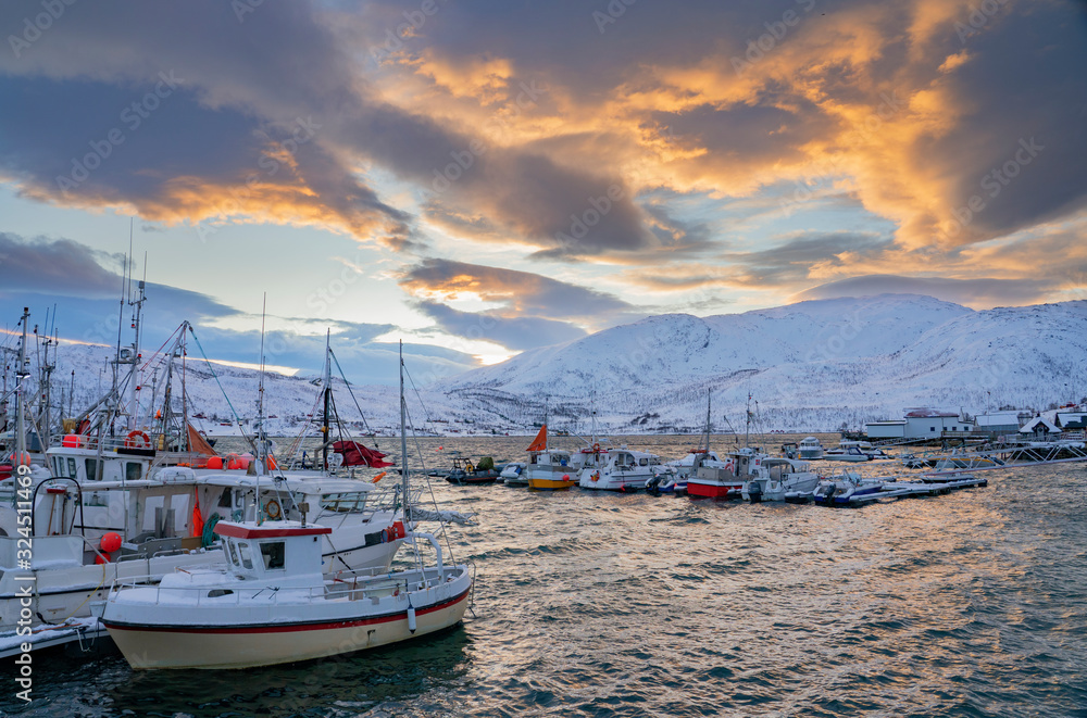 fishing harbour of Vengsoy in northern Norway near Tromso at the end of the polar night