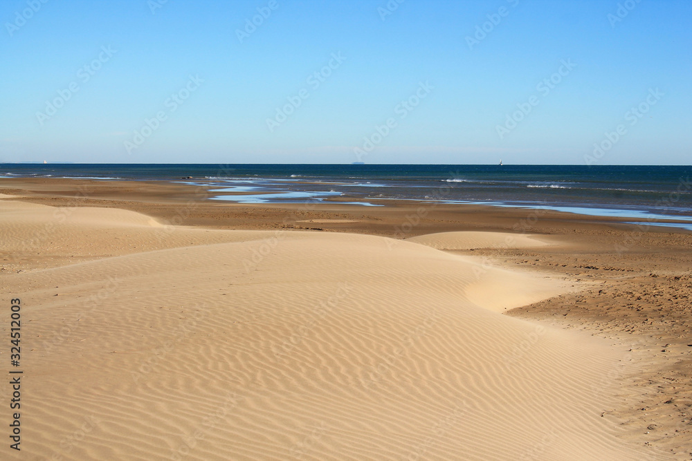 The Amazing sandy beach in Gruissan in the Aude department, France The Amazing sandy beach in Gruissan in the Aude department, France