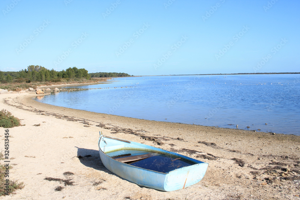 The natural Ingril lagoon in Frontignan, a seaside resort in the Mediterranean sea, Herault, Occitanie, France The natural Ingril lagoon in Frontignan, a seaside resort in the Mediterranean sea, Herault, Occitanie, France