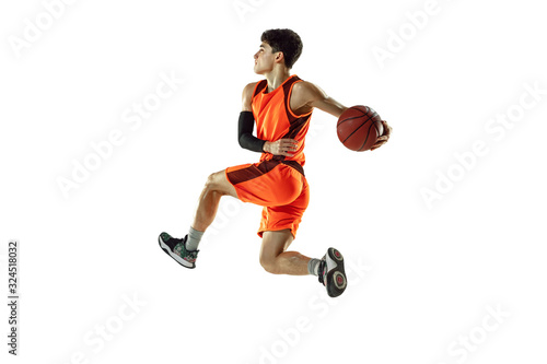 Print op canvas Young basketball player of team wearing sportwear training, practicing in action, motion in jump, flight isolated on white background