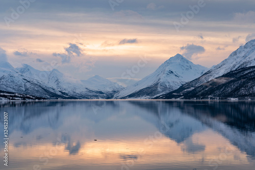icy winter landscape in the Lyngen Alps, Finnmark in northern Norway north of the polar circle photo