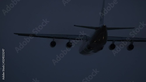 Sochi, Russia - 02.02.2020 The large transport plane AN 124 110 Ruslan takes off from the airfield. It's night time. Airport. 