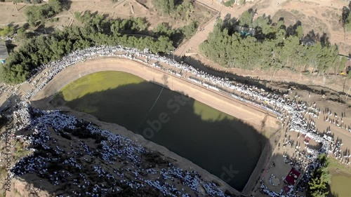Drone view over Ethiopian Timkat Ceremony Gathering at reservoir for baptism , Axum, Ethiopia,19.1.2020 photo