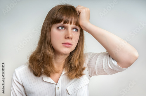 Young disappointed woman in depression