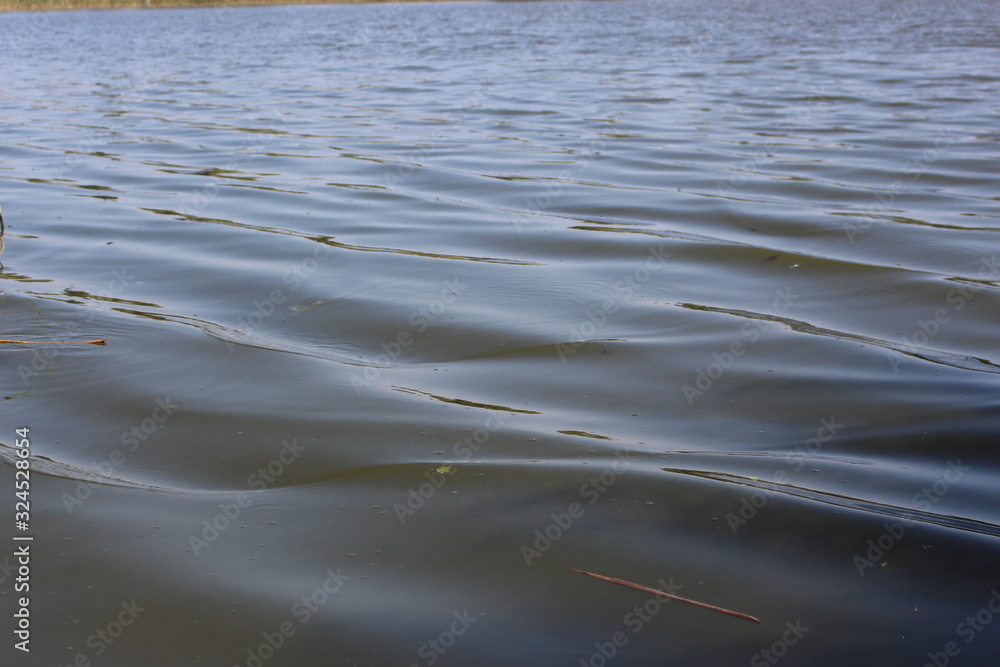 The river flows, silence is free, small waves. The river flows, silence is free, small waves.