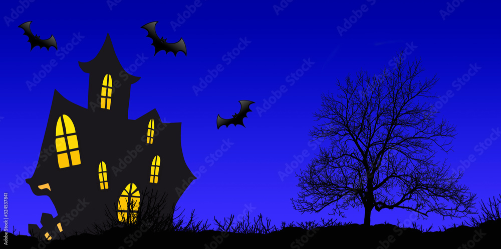 Haunted House  silhouetted againist the evening sunset on Halloween night