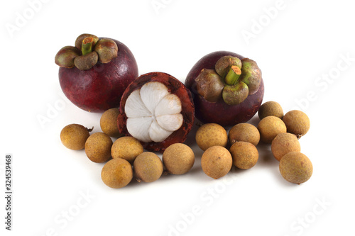 Mangosteens, peeled mangosteen and longans photo