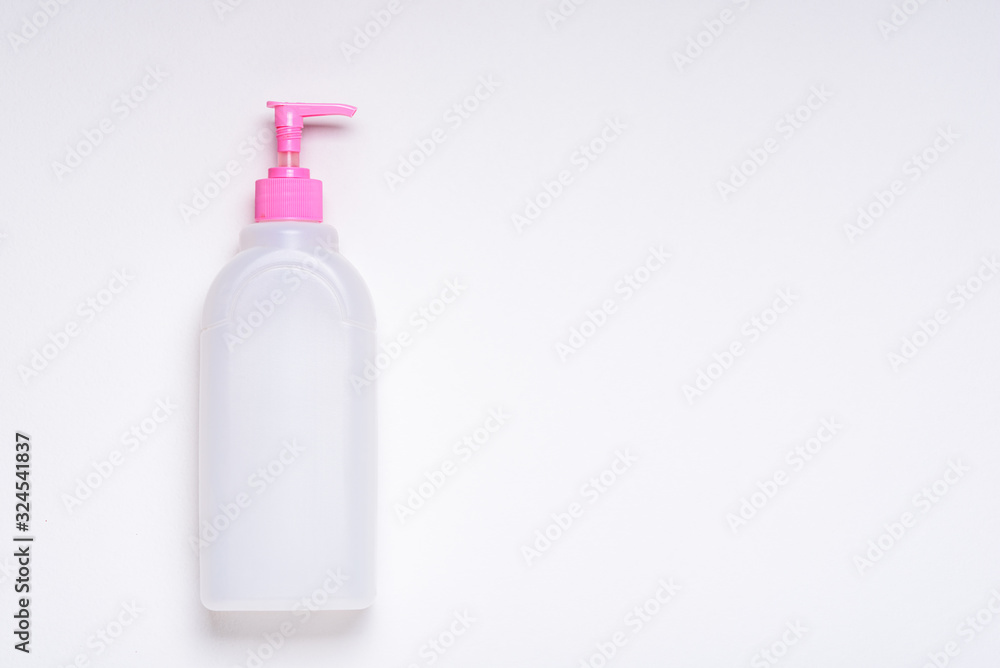 empty white bottle with pink lid and dispenser on white background for branding empty white bottle with pink lid and dispenser on white background for branding