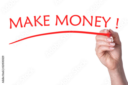 Hand writes words make money with red marker