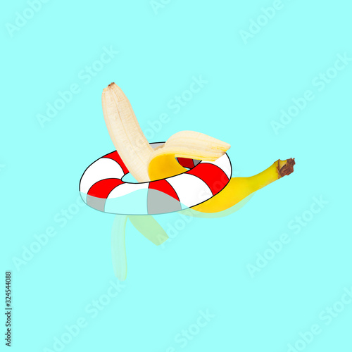 Banana swimming in swimring on blue water pool background. Copyspace for your proposal. Modern design. Contemporary artwork, collage. Concept of vacation, holidays, organic world, food, fruits. photo