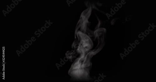 White natural rising steam from food or hot drink isolated on a black background. Сan be used in any projects with hot food. Blackmagic Cinema Camera. photo