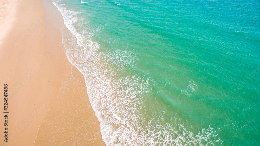 Top view aerial image from drone of an stunning beautiful sea landscape beach with turquoise water with copy space for your text.Beautiful Sand beach with turquoise water,aerial UAV drone shot Top view aerial image from drone of an stunning beautiful sea landscape beach with turquoise water with copy space for your text.Beautiful Sand beach with turquoise water,aerial UAV drone shot