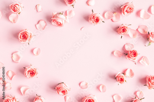 Flowers composition. Rose flowers on pink background. Valentines day, mothers day, womens day concept. Flat lay, top view, copy space