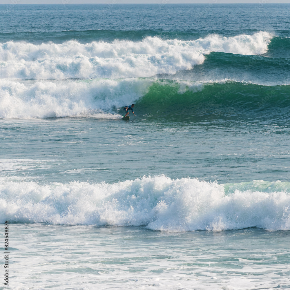 surfer in massive waves