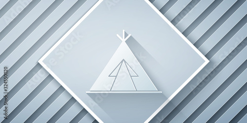 Paper cut Traditional indian teepee or wigwam icon isolated on grey background. Indian tent. Paper art style. Vector Illustration
