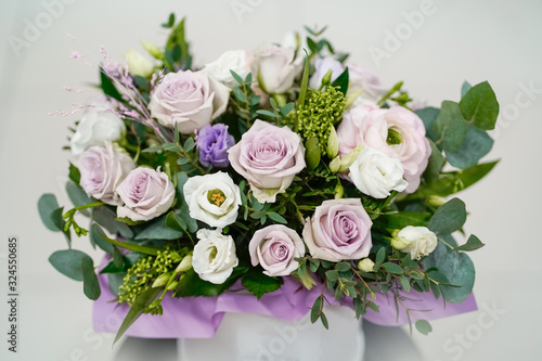 A bouquet of delicate fresh flowers in lilac tones © Margarita SoulRay