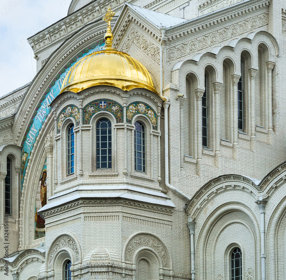 Gilded dome of the orthodox Sea Cathedral of St. Nicholas in Kronstadt, St. Petersburg, Russia