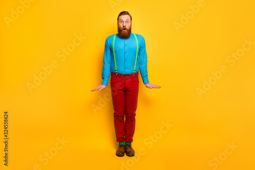 Full length body size view of his he nice attractive bearded funky amazed guy posing fooling isolated over bright vivid shine vibrant yellow color background