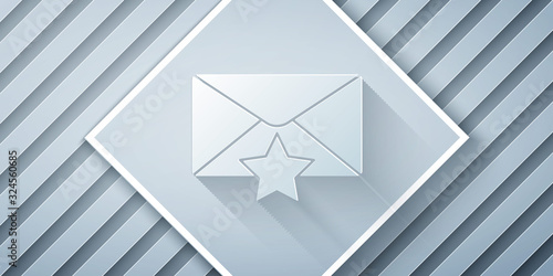 Paper cut Envelope with star icon isolated on grey background. Important email, add to favourite icon. Starred message mail. Paper art style. Vector Illustration