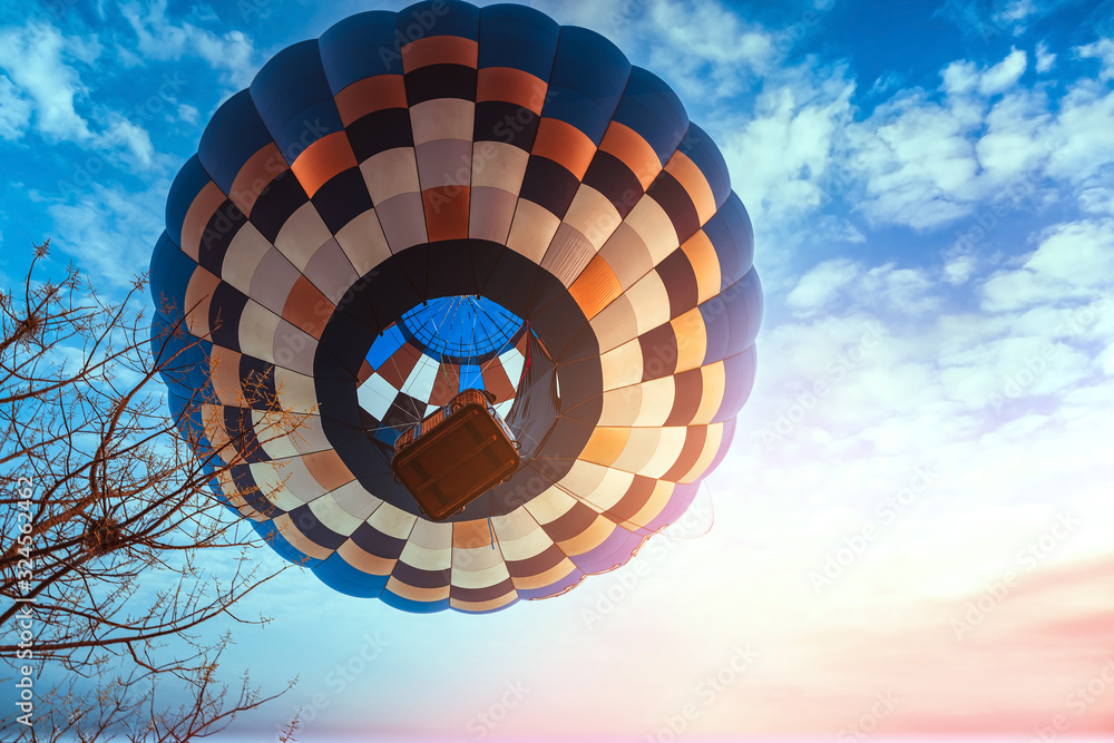 From the bottom view, Hot-air balloons flying in colorful sky in the morning From the bottom view, Hot-air balloons flying in colorful sky in the morning