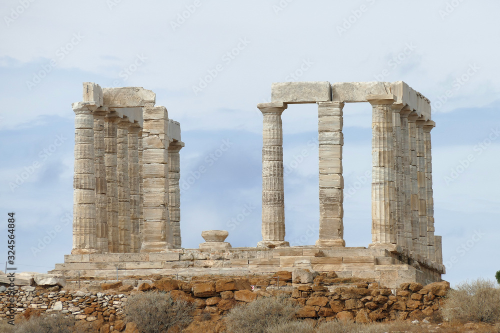 The Remains of a Greek temple dedicated to Poseidon, on the promontory of Cape Sunio ,located on the southern tip of Attica, Greece