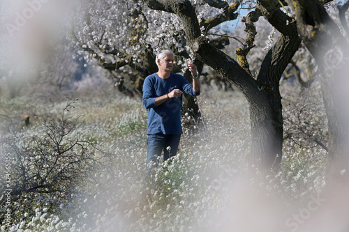 farmer man in an apple field