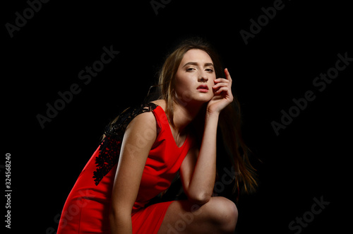 beautiful young caucasian woman portrait on black background