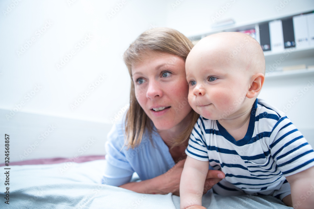 Happy mother with baby at home Happy mother with baby at home