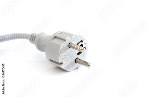 plug of electrical cord isolated on a white background. Close-up.