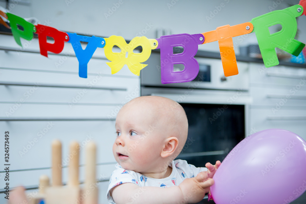 Cute child celebrating first birthday Cute child celebrating first birthday