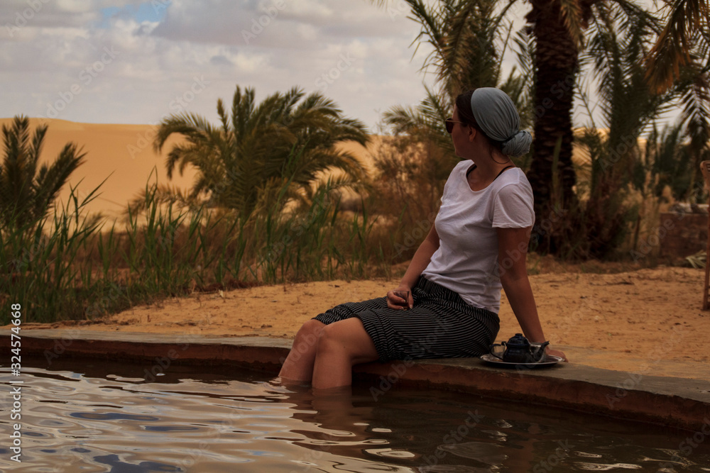 Siwa Oasis protected area, women enjoying hot spring in the Egyptian desert