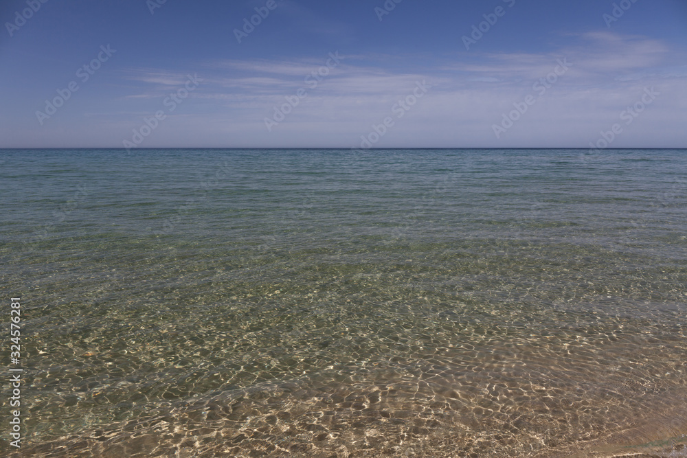 Caspian Sea. Clear sea water. The sea is blue with small waves. selective focus Caspian Sea. Clear sea water. The sea is blue with small waves. selective focus
