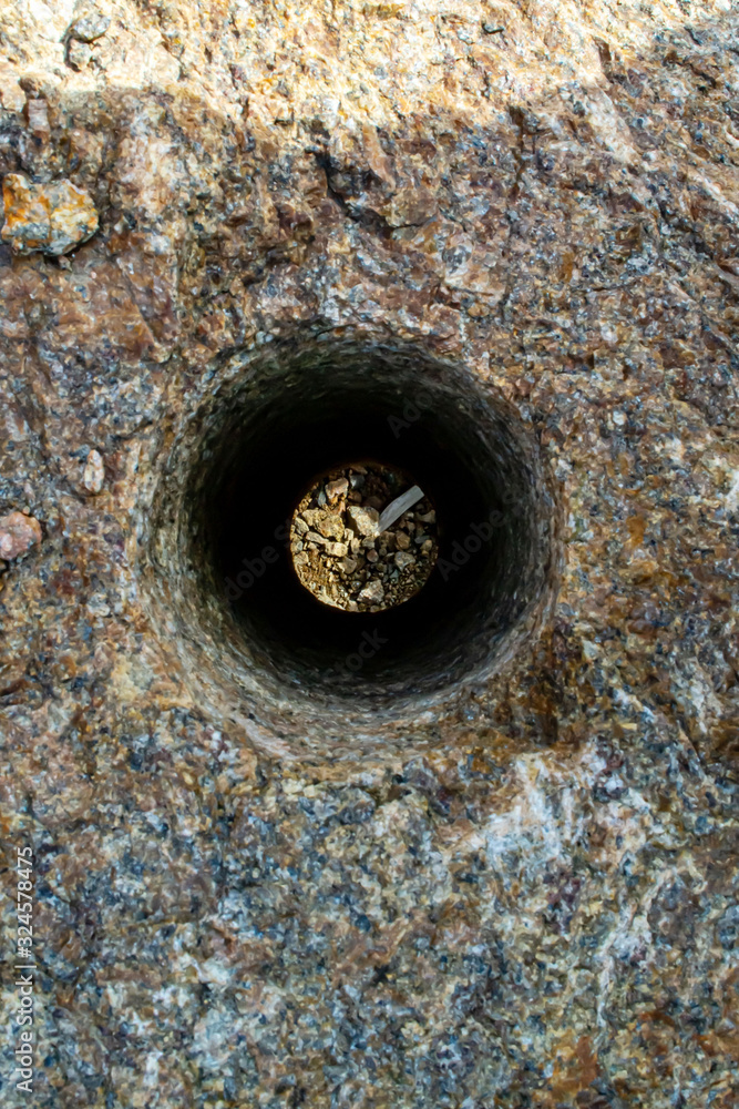 Through hole in granite stone