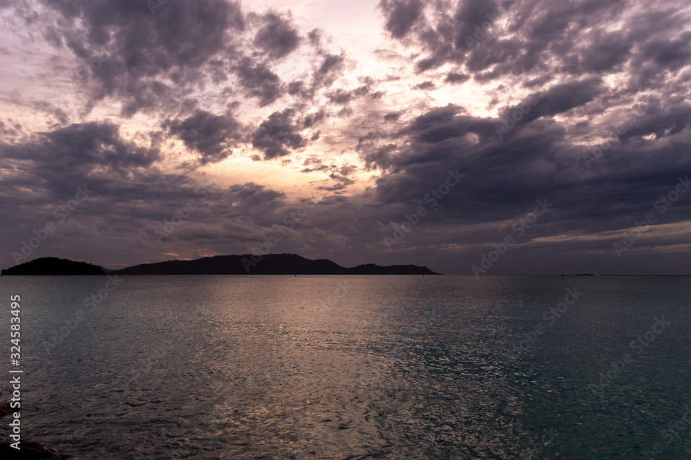 Sunrise over seychelles islands. First beams of light Sunrise over seychelles islands. First beams of light