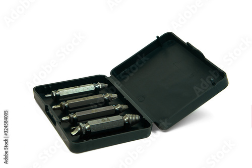 Set of screw extractors in a black plastic box, isolated on a white background