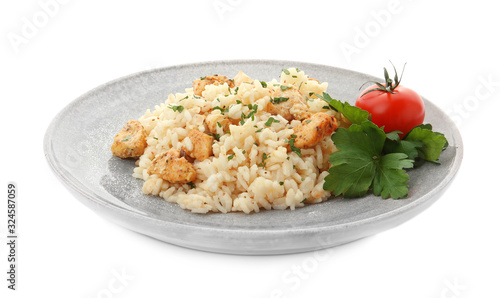 Delicious risotto with chicken isolated on white