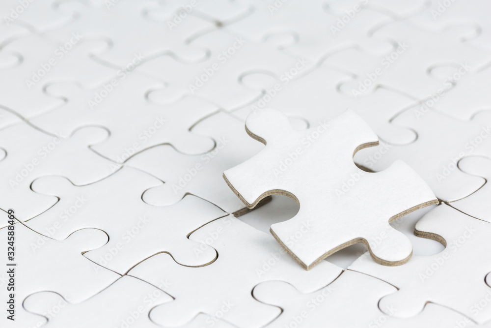 Close up of jigsaw puzzle.Fulfill and fix the problem of incomplete.Business solutions for success and strategy concept. Close up of jigsaw puzzle.Fulfill and fix the problem of incomplete.Business solutions for success and strategy concept.