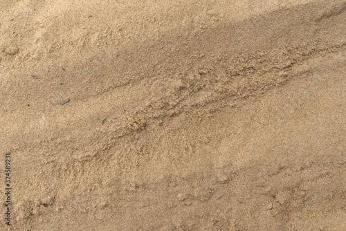 Foto Sand on the beach as background