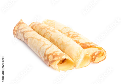 Rolled fresh thin pancakes isolated on white