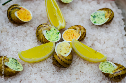 Helix Aspersa Muller, Maxima snail.  Edible snails with butter and seasonings.