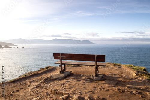 Wooden bench on a cliff