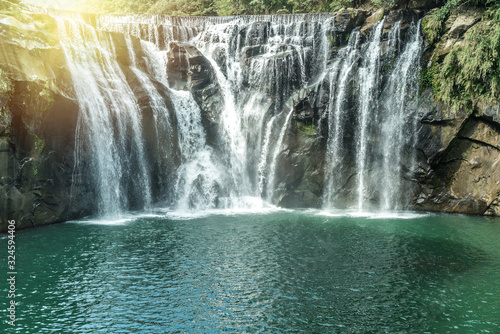 Shihfen Waterfall, Fifteen meters tall and 30 meters wide, It is the largest curtain-type waterfall in Taiwan