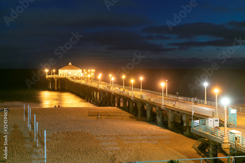 Illuminations of Manhattan Beach Pier at night, Los angeles, California