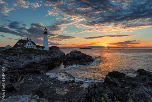 Sunrise at Portland Head Lighthouse in Cape Elizabeth, New England, Maine, USA. 