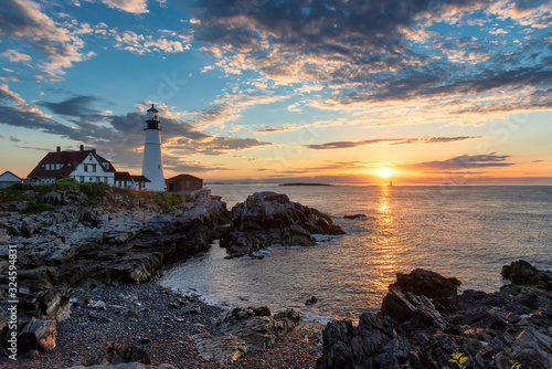 Sunrise at Portland Head Lighthouse in Cape Elizabeth, New England, Maine, USA.	 photo