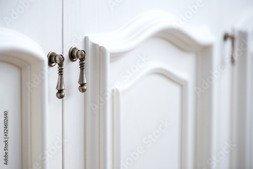 Detail of vintage white cabinet - selective focus, copy space