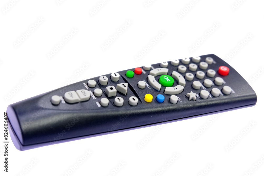 one black, dark gray TV remote control channel switch, green OK button, on a light, white background with backlight one black, dark gray TV remote control channel switch, green OK button, on a light, white background with backlight